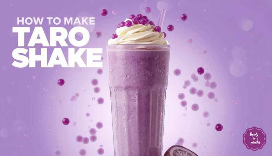 Creamy purple taro shake in tall glass with wide straw and tapioca pearls, garnished with whipped cream on wooden table